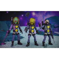 Three alien astronaut action figures in purple suits holding futuristic weapons against a colorful space backdrop