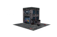 Model of a small building with a garage door on a white background