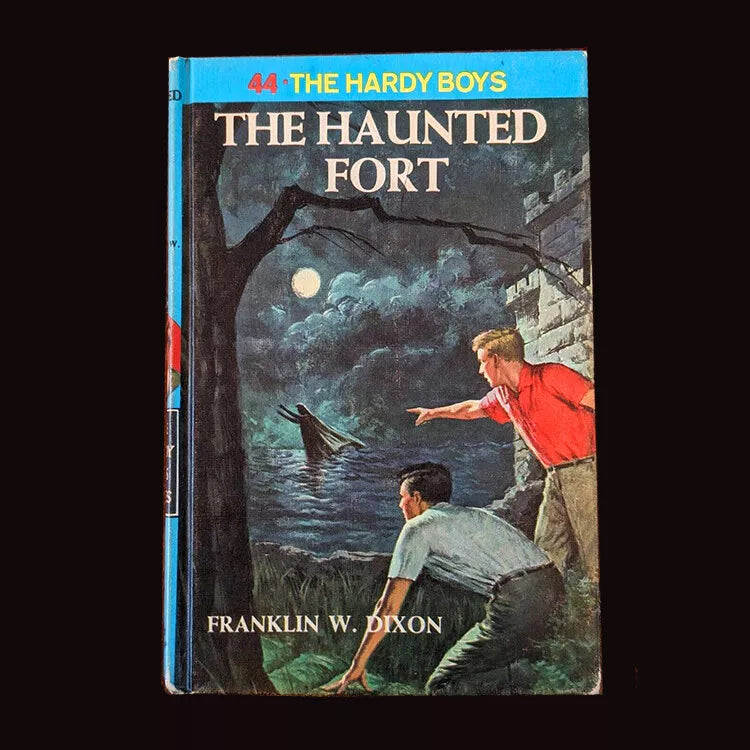 44 The Haunted Fort (Blue Bar):  Vintage Hardy Boys Book Blue-Back image 0