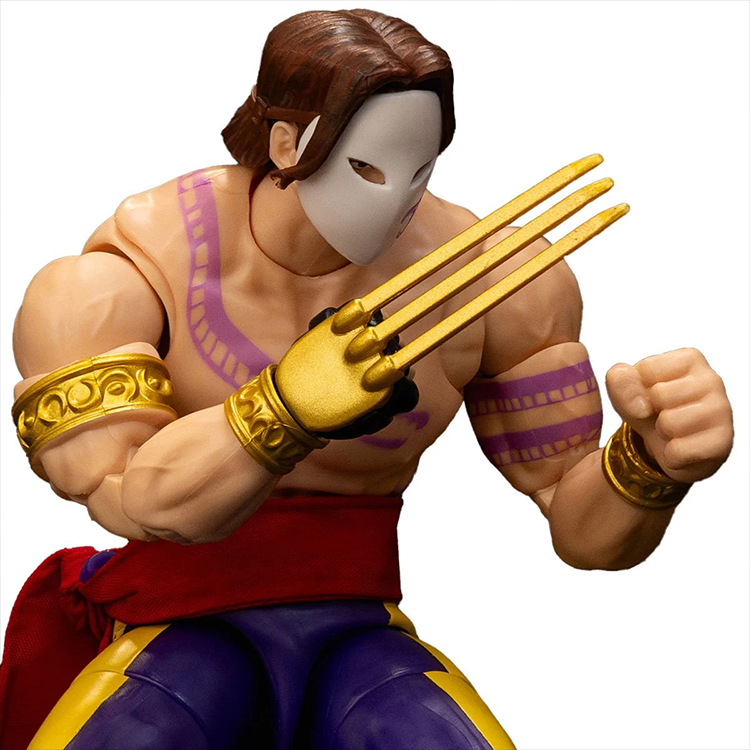 Jada Toys Ultra Street Fighter II Vega action figure in masked pose with clawed glove and purple yellow outfit close-up