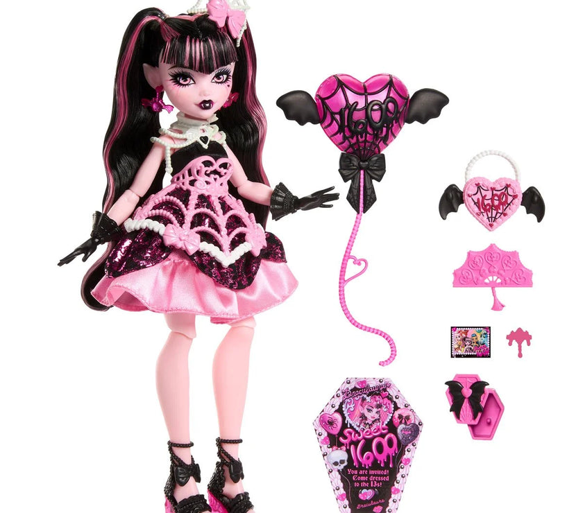 Monster High Draculaura birthday doll in pink and black outfit with party accessories by Mattel