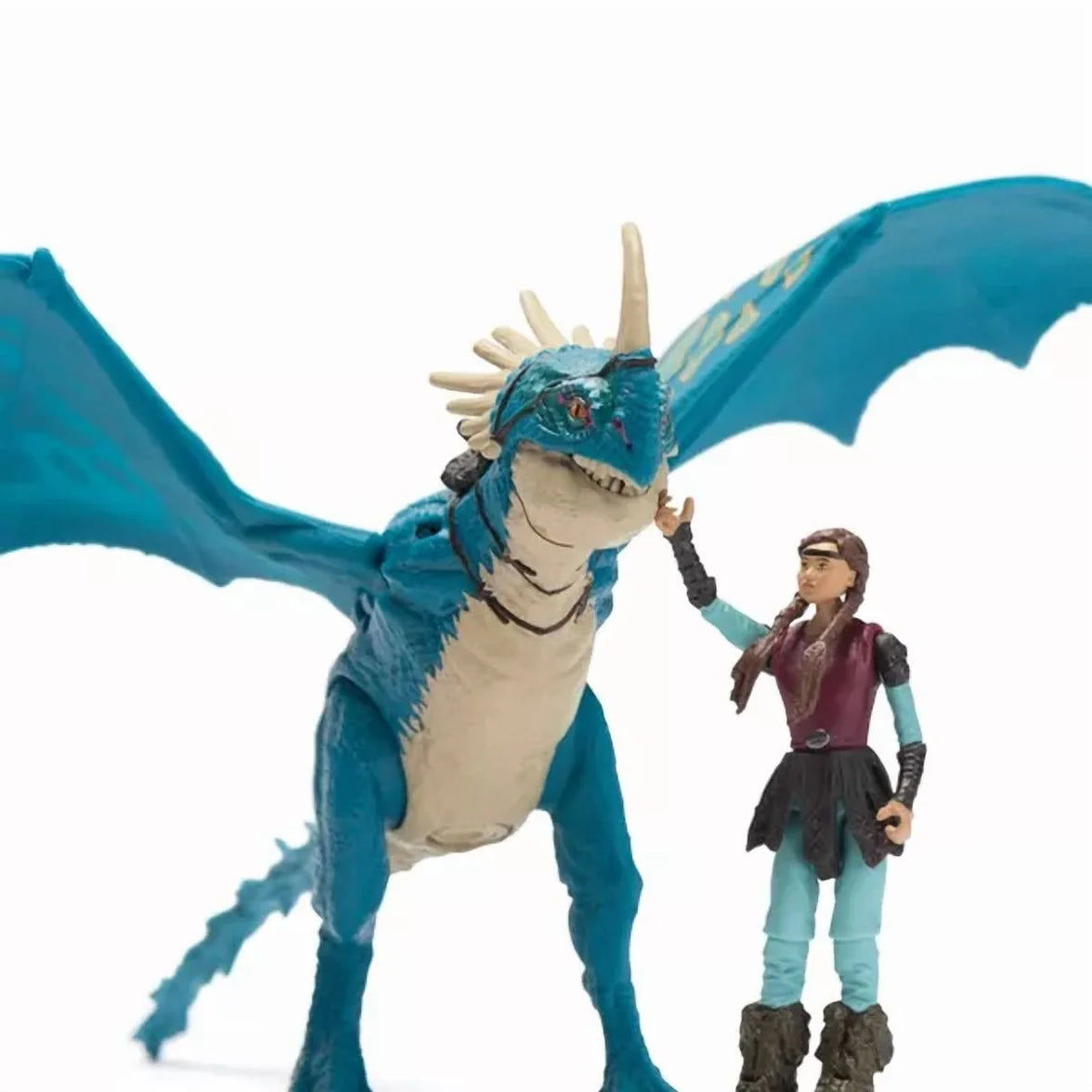 Spin Master How to Train Your Dragon Stormfly dragon and Astrid action figures set standing side by side.