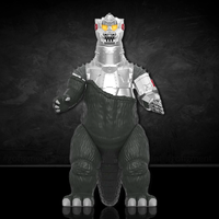 Half Transformed Mechagodzilla figure from 1974 with exposed mechanical parts standing on a black background