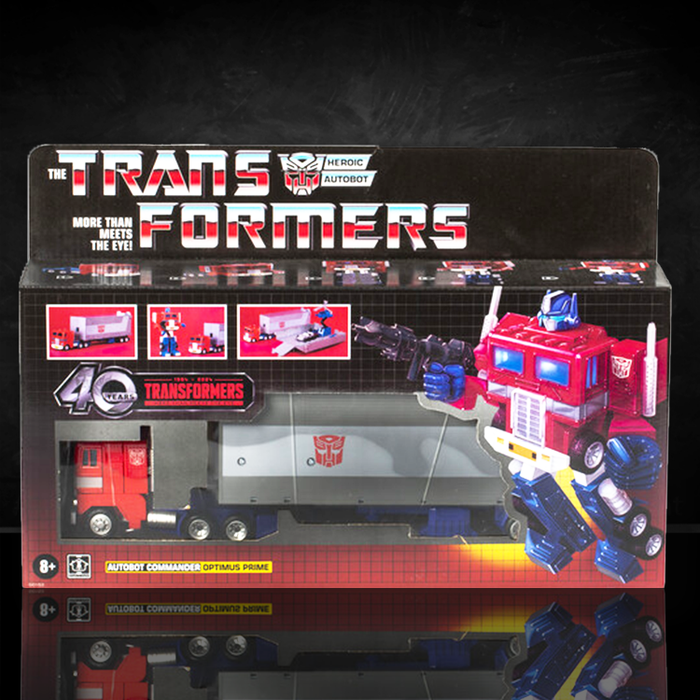 Hasbro Transformers 40th Anniversary G1 Optimus Prime action figure with truck and trailer in retro packaging