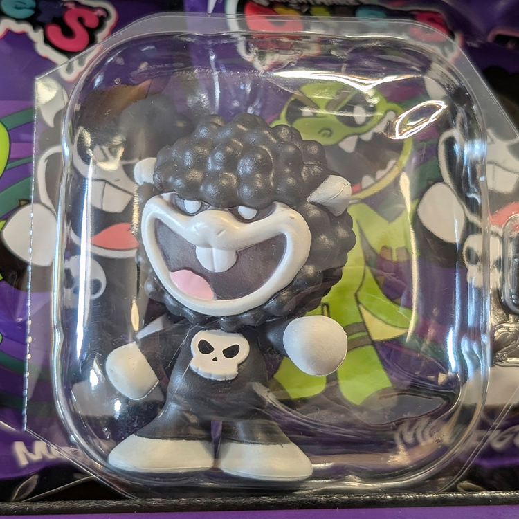 Go Figment Nightmare Critters Series 4 mini figure with black furry head and skull emblem in clear packaging