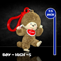 Sekiguchi Monchhichi 3.5-inch boy figure with soft flocked vinyl holding pacifier and red clip keychain attachment