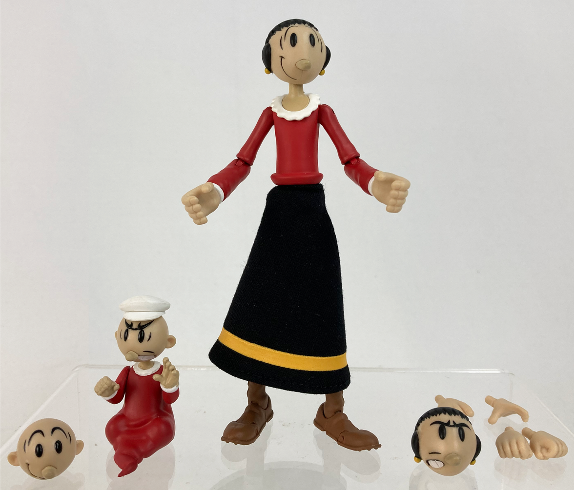 Boss Fight Studio Llc Olive Oyl figure in red shirt and black skirt with yellow stripe with Sweat Pea figure and extra faces and hands