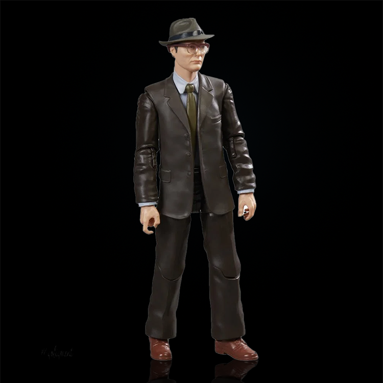 Indiana Jones action figure in brown suit, hat, and glasses from Hasbro, part of Last Crusade collectible set