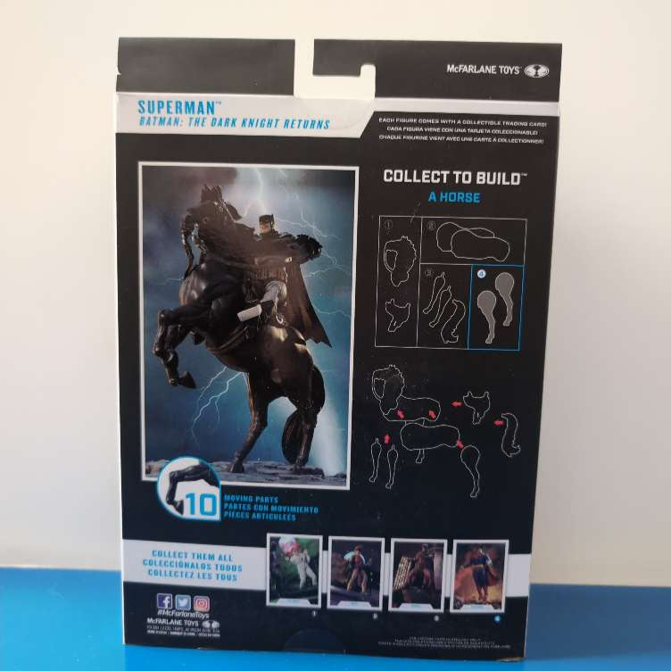 McFarlane Superman The Dark Knight Returns action figure packaging with horse parts diagram and collectible card details