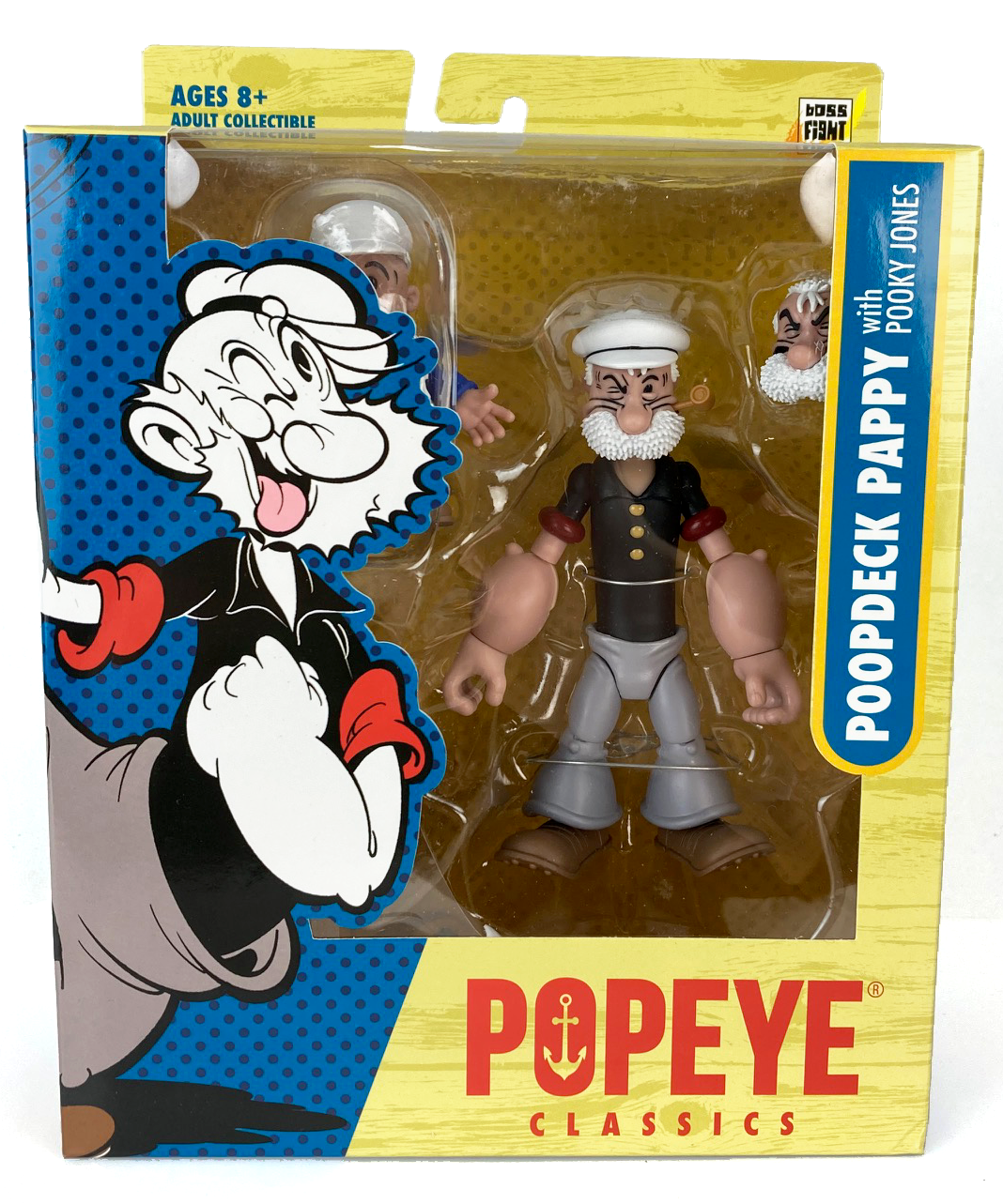 Boss Fight Studio Llc Poopdeck Pappy figure with white sailor hat, black shirt, gray pants, and extra head accessory in packaging
