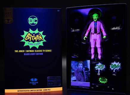 The Joker Black Light Gold Label Mcfarlane Action Figure 6" glowing in black light with comic-style sound effect accessories