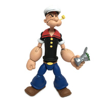 Boss Fight Studio Llc Popeye Classics figure in black shirt, blue pants holding crushed can with pipe in mouth and winking expression