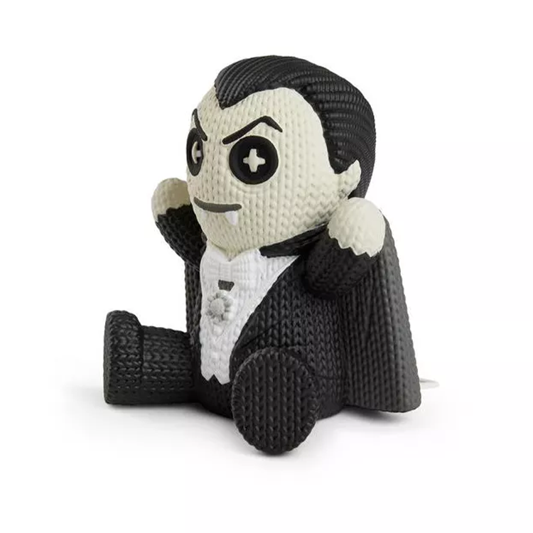 Handmade by Robots Dracula Glow in the Dark Vinyl Figure sitting with textured design and black cape