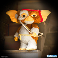 Super7 Gremlins 2 Battle Ready Gizmo figure holding bow and arrow with red headband in dark setting