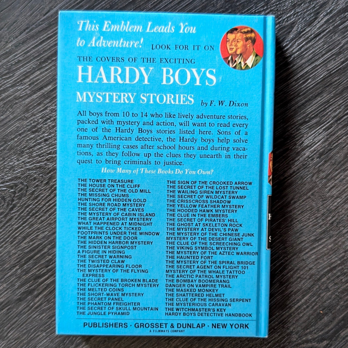 35 The Clue in the Embers (1972):  Hardy Boys Book Blue-Back image 2