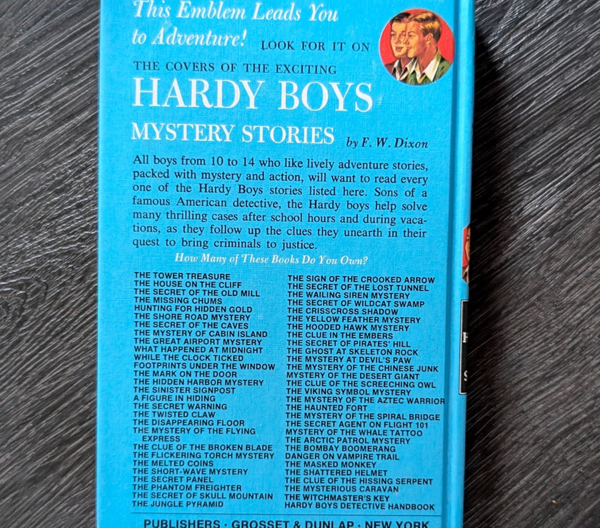 35 The Clue in the Embers (1972):  Hardy Boys Book Blue-Back image 2