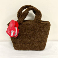 K-Wonderland Monchhichi boa insulated lunch tote bag with cozy brown fleece and short handles against white background
