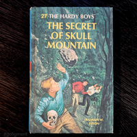 27 The Secret of Skull Mountain (1966-YN):  Vintage Hardy Boys Book Blue- image 0