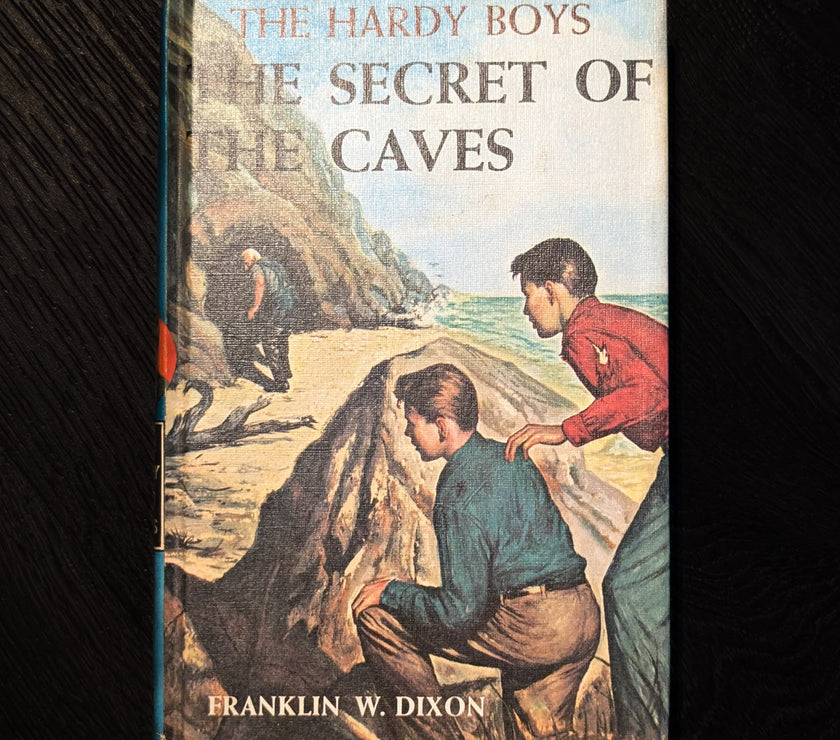 07 The Secret of the Caves (1964):  Vintage Hardy Boys Book Blue-Back image 0