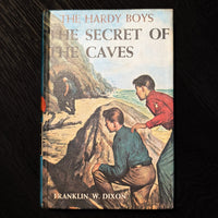 07 The Secret of the Caves (1964):  Vintage Hardy Boys Book Blue-Back image 0