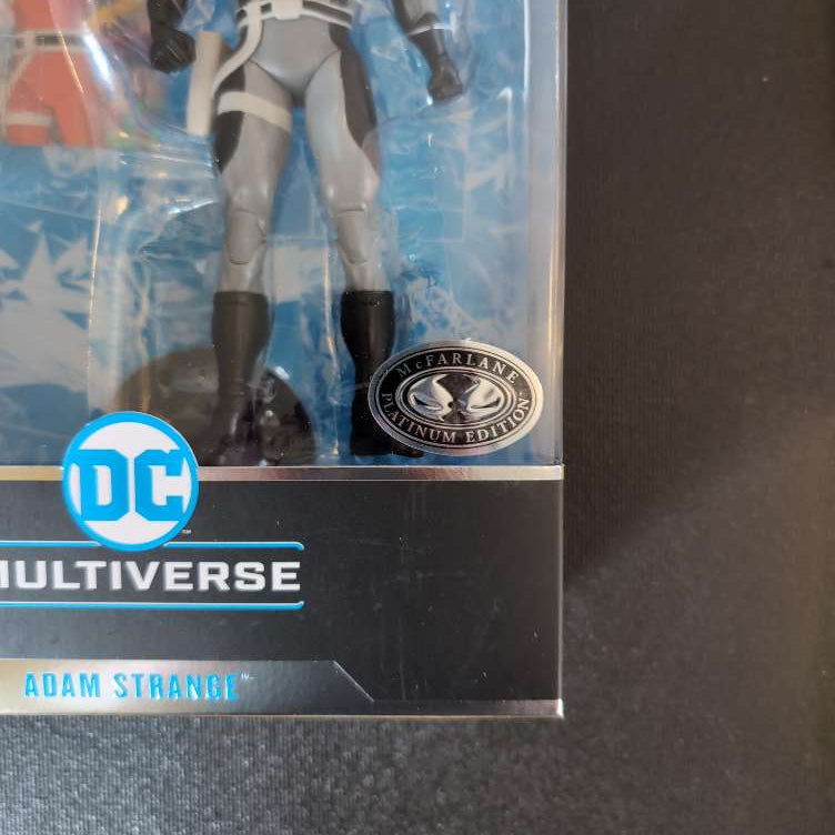 McFarlane DC Multiverse Adam Strange Platinum Edition action figure packaging close-up with logo and character name text