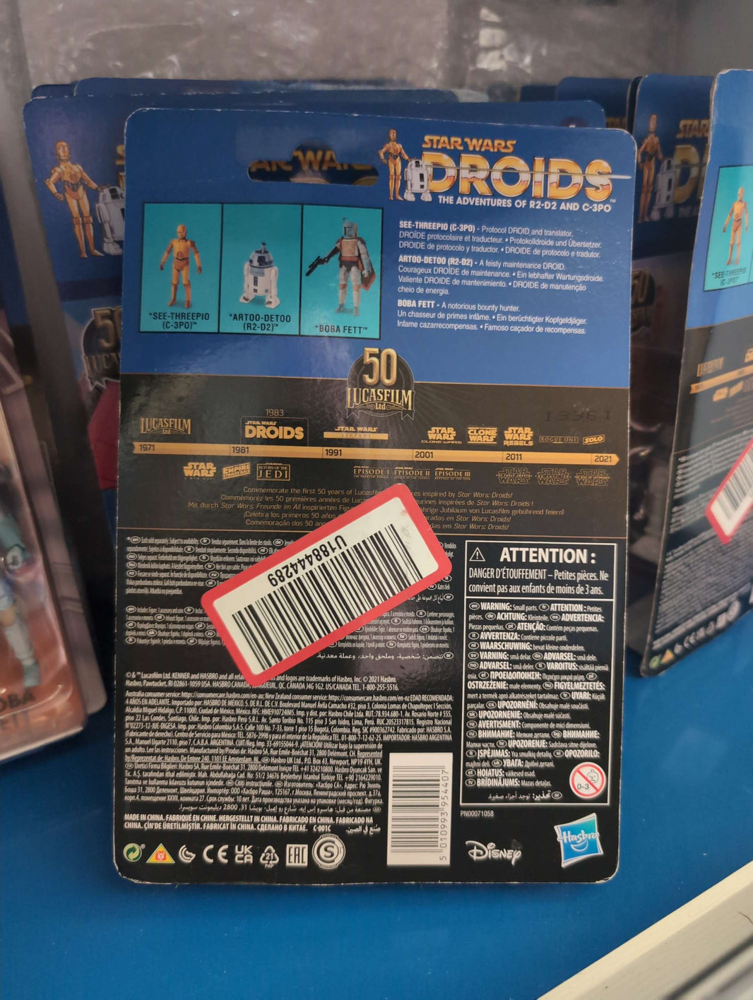 Back packaging of Artoo-Detoo R2-D2 Droids Action Figure in blister card with Star Wars branding by Hasbro