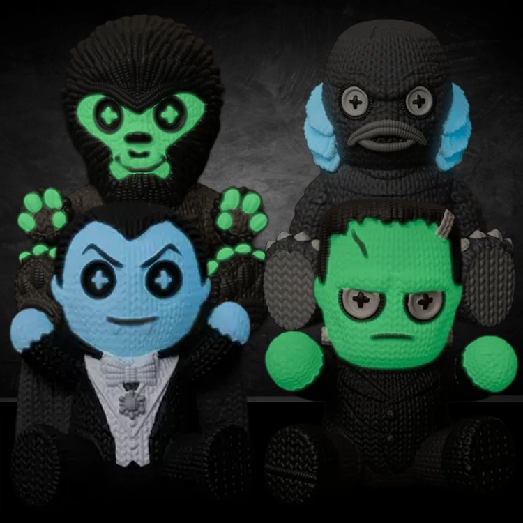 Glow in the Dark Vinyl Figures 4 pack Handmade by Robots featuring unique collectible vinyl action figures in black with green and blue glow accents