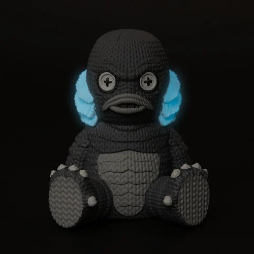 Glow in the Dark Vinyl Figures 4 pack Handmade by Robots featuring knitted black monster with glowing blue ears