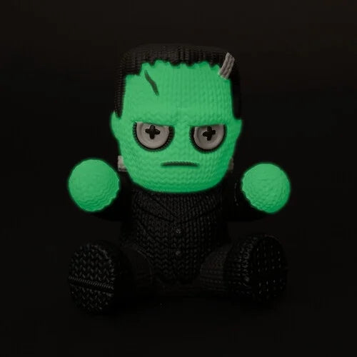 Glow in the Dark Vinyl Figures 4 pack Handmade by Robots featuring a green-faced Frankenstein action figure