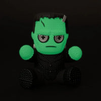 Glow in the Dark Vinyl Figures 4 pack Handmade by Robots featuring a green-faced Frankenstein action figure
