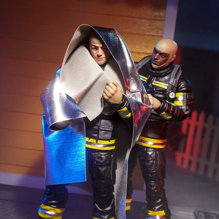 Hasbro GI Joe Classified Series firefighter figure wearing black and yellow gear with silver rescue blanket