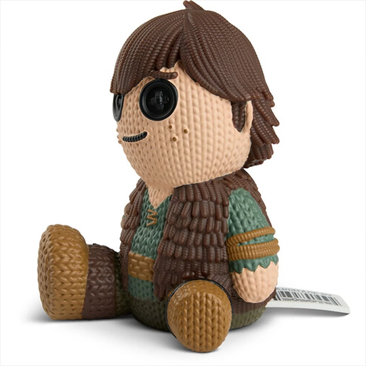 Handmade by Robots Hiccup 251 action figure with textured brown hair and green outfit sitting down
