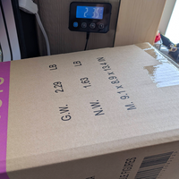 Cardboard shipping box for Playskool My Buddy 18-inch doll with weight and dimension details visible