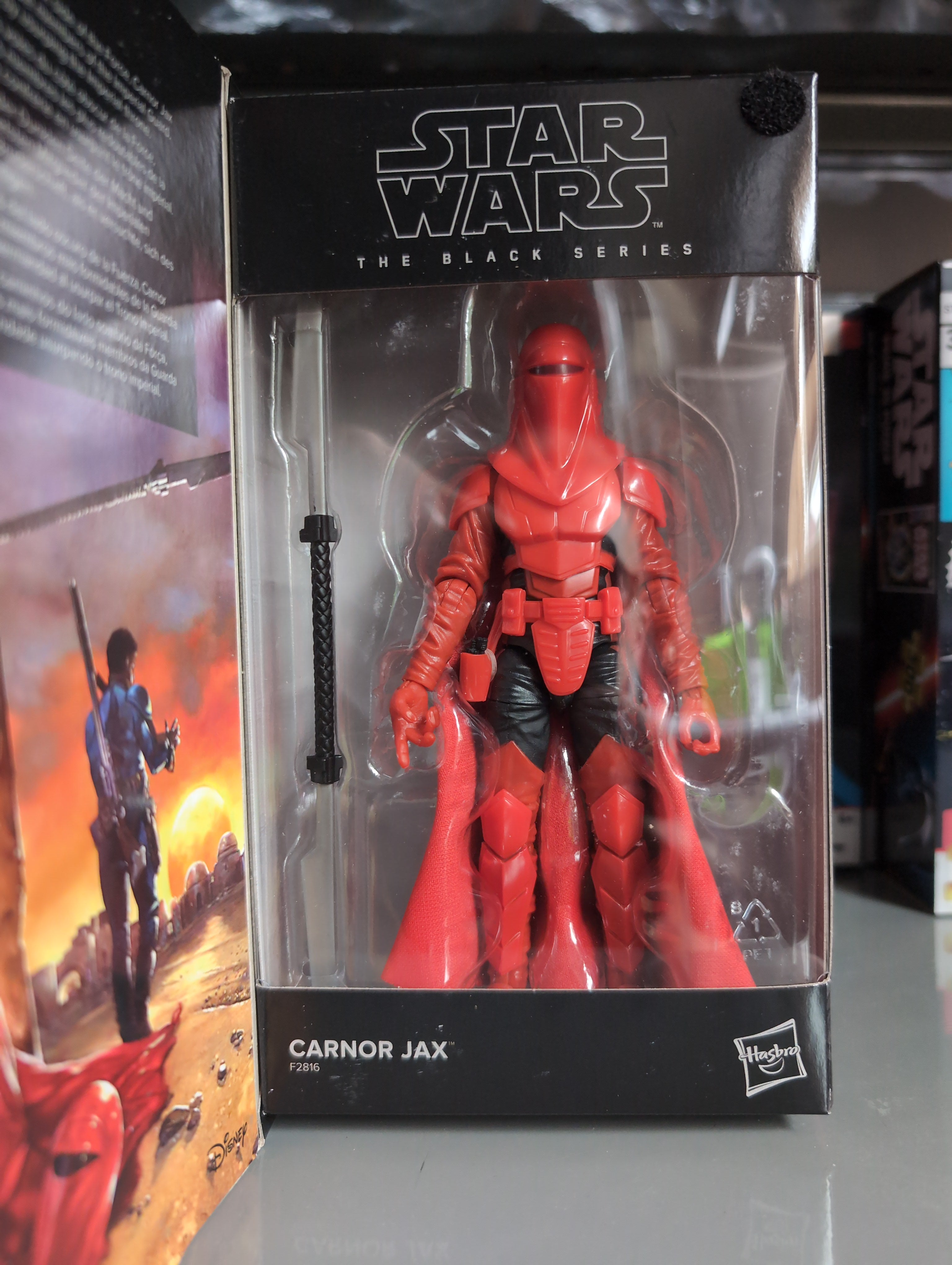 Hasbro Star Wars Black Series Carnor Jax action figure in detailed red armor with accessories in packaging