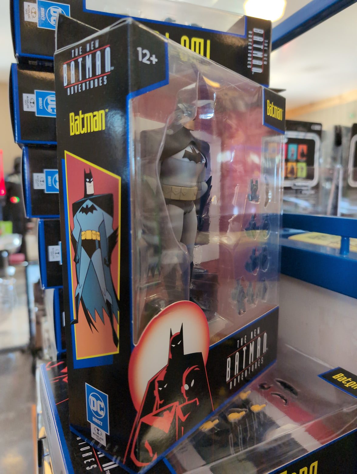 McFarlane 6-inch Batman action figure from The New Batman Adventures in collectible window packaging with accessories.