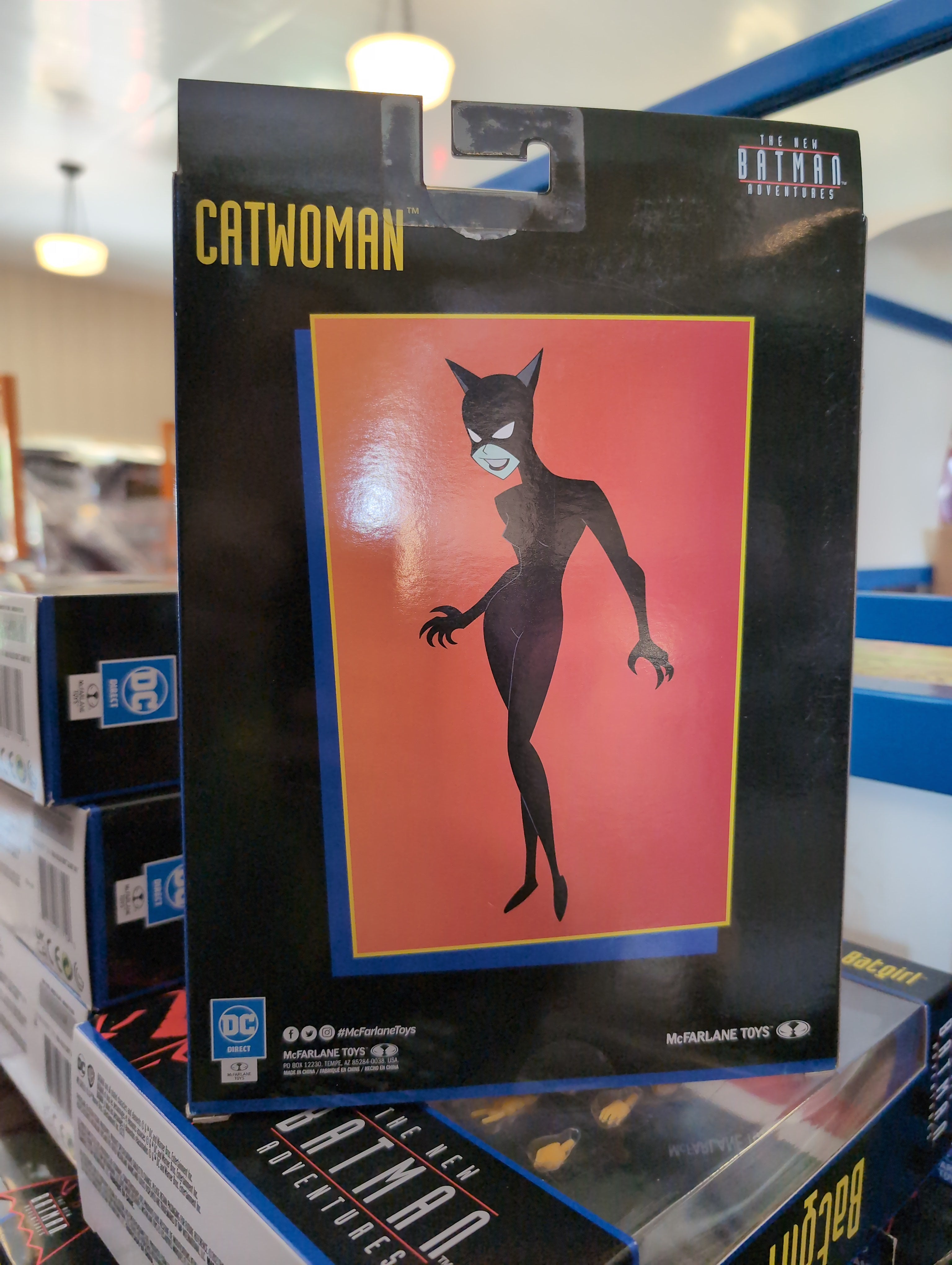 McFarlane Catwoman action figure packaging from The New Batman Adventures with animated style artwork.