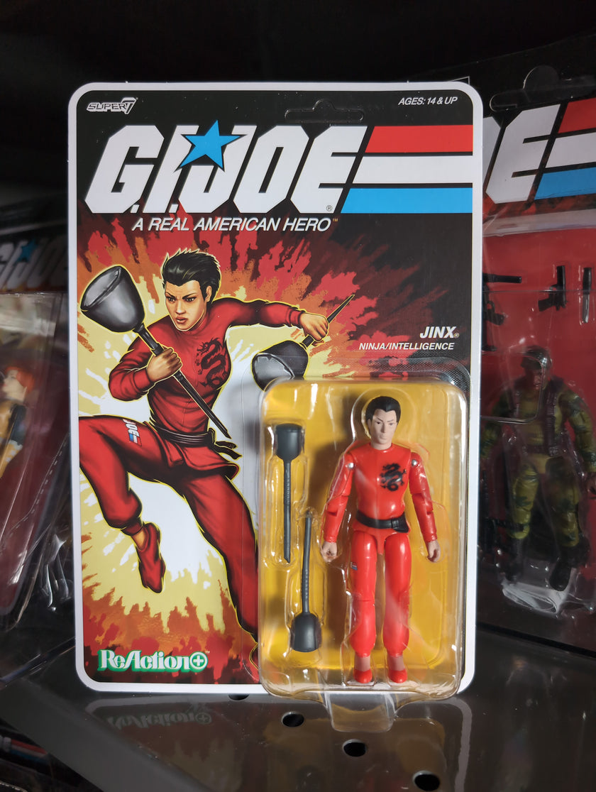 Hasbro G.I. Joe Jinx action figure in red ninja outfit with sparring batons in vintage style packaging