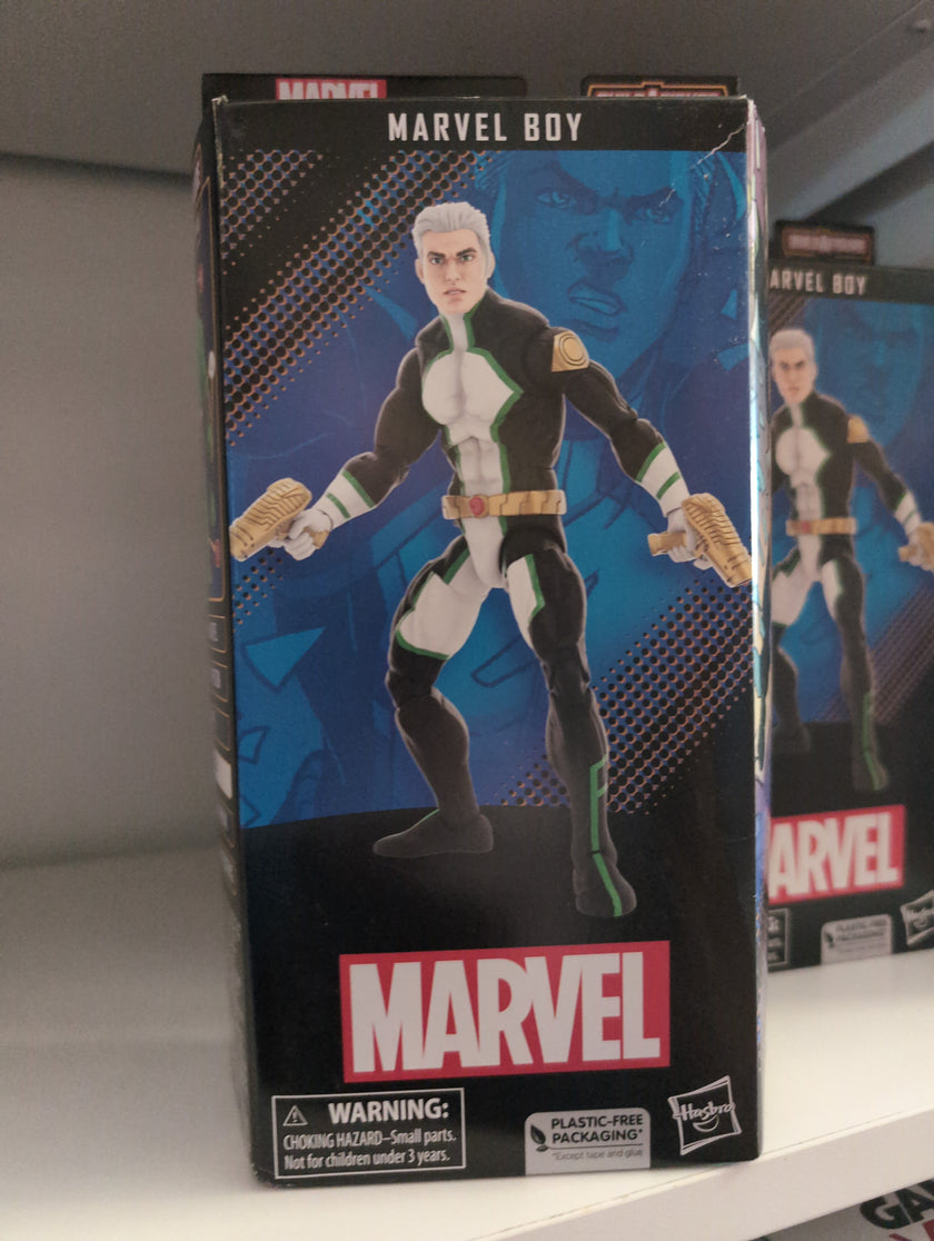 Hasbro Marvel Legends Marvel Boy action figure in black and white suit with gold weapons in collectible packaging