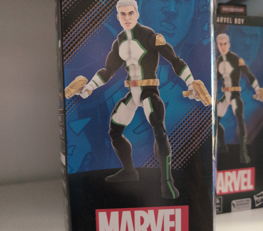 Hasbro Marvel Legends Marvel Boy action figure in black and white suit with gold weapons in collectible packaging