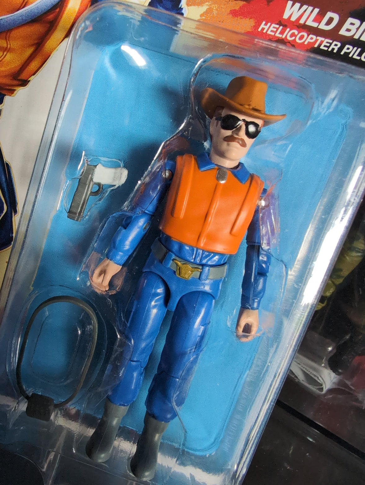 Hasbro G.I. Joe Wild Bill helicopter pilot action figure with cowboy hat and removable accessories in blister packaging