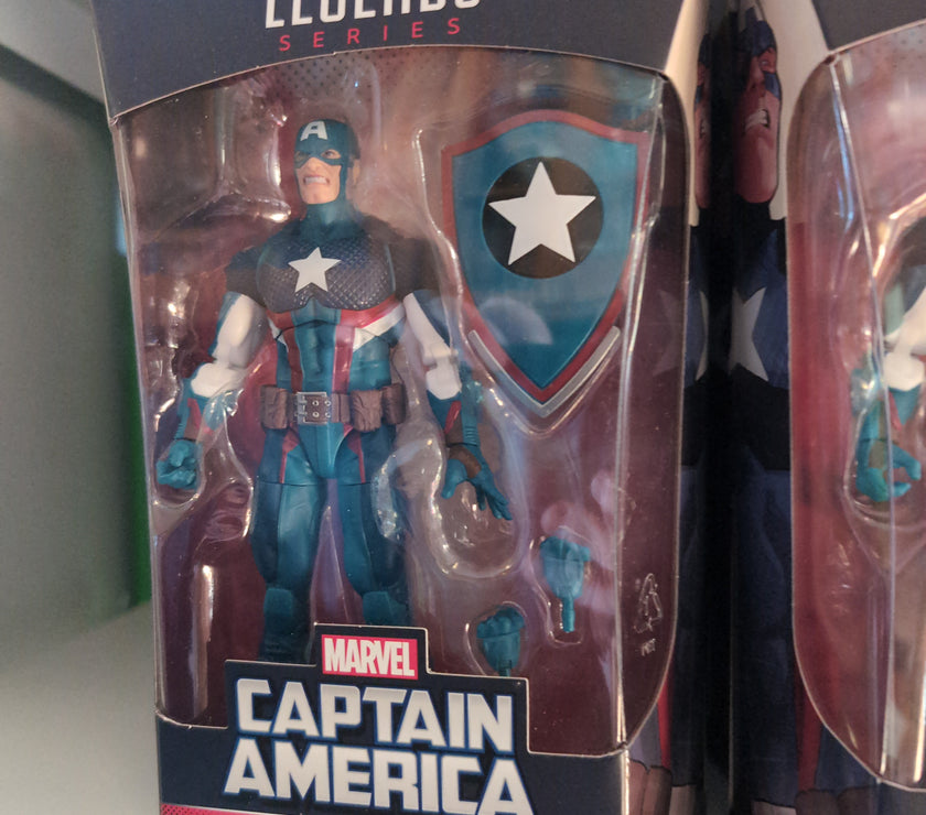 Hasbro Marvel Legends Captain America Secret Empire action figure with shield and extra hands in packaging