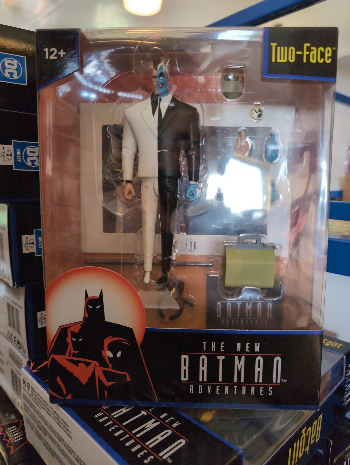 McFarlane Two-Face action figure from The New Batman Adventures with collectible accessories and dual-tone suit.