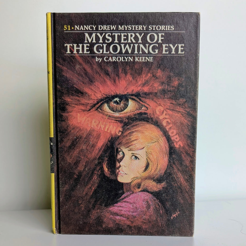 Vintage 1974 Nancy Drew Mystery of the Glowing Eye hardcover book by Grosset & Dunlap Inc. front cover view