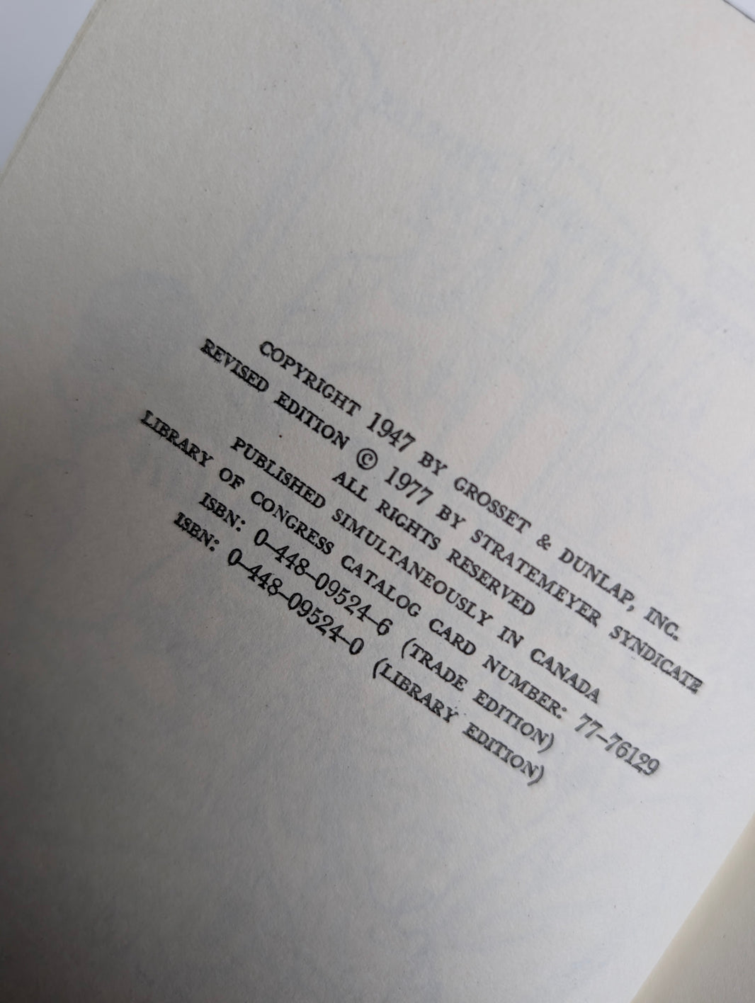 Copyright page of 1947 Grosset & Dunlap Nancy Drew Mystery book The Clue in the Old Album revised edition