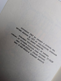Copyright page of 1947 Grosset & Dunlap Nancy Drew Mystery book The Clue in the Old Album revised edition