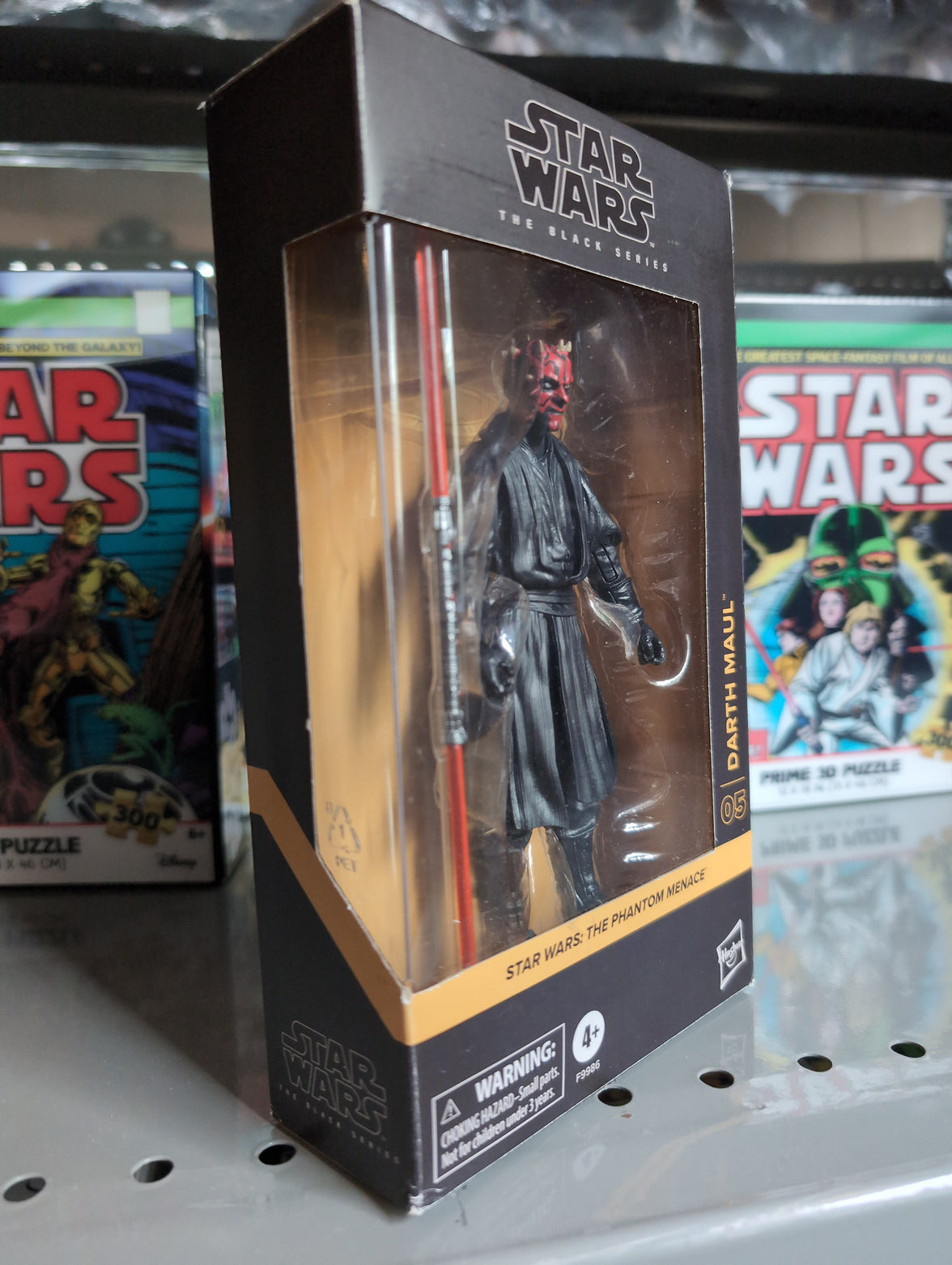 Hasbro Star Wars Black Series 6-inch Darth Maul action figure in Phantom Menace packaging on display shelf