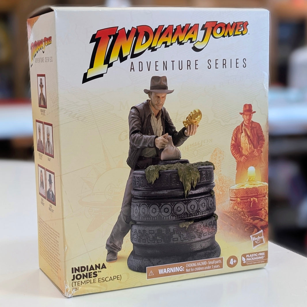 Indiana Jones Temple Escape 6-inch action figure in detailed pose with artifact, Hasbro Adventure Series collectible packaging