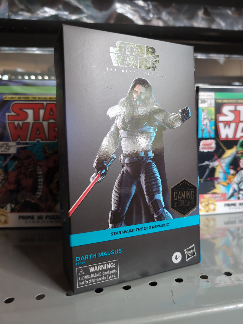 Hasbro Star Wars The Black Series Darth Malgus action figure in packaging with lightsaber and hooded cape.