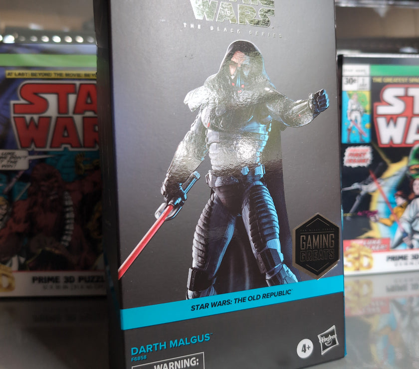 Hasbro Star Wars The Black Series Darth Malgus action figure in packaging with lightsaber and hooded cape.