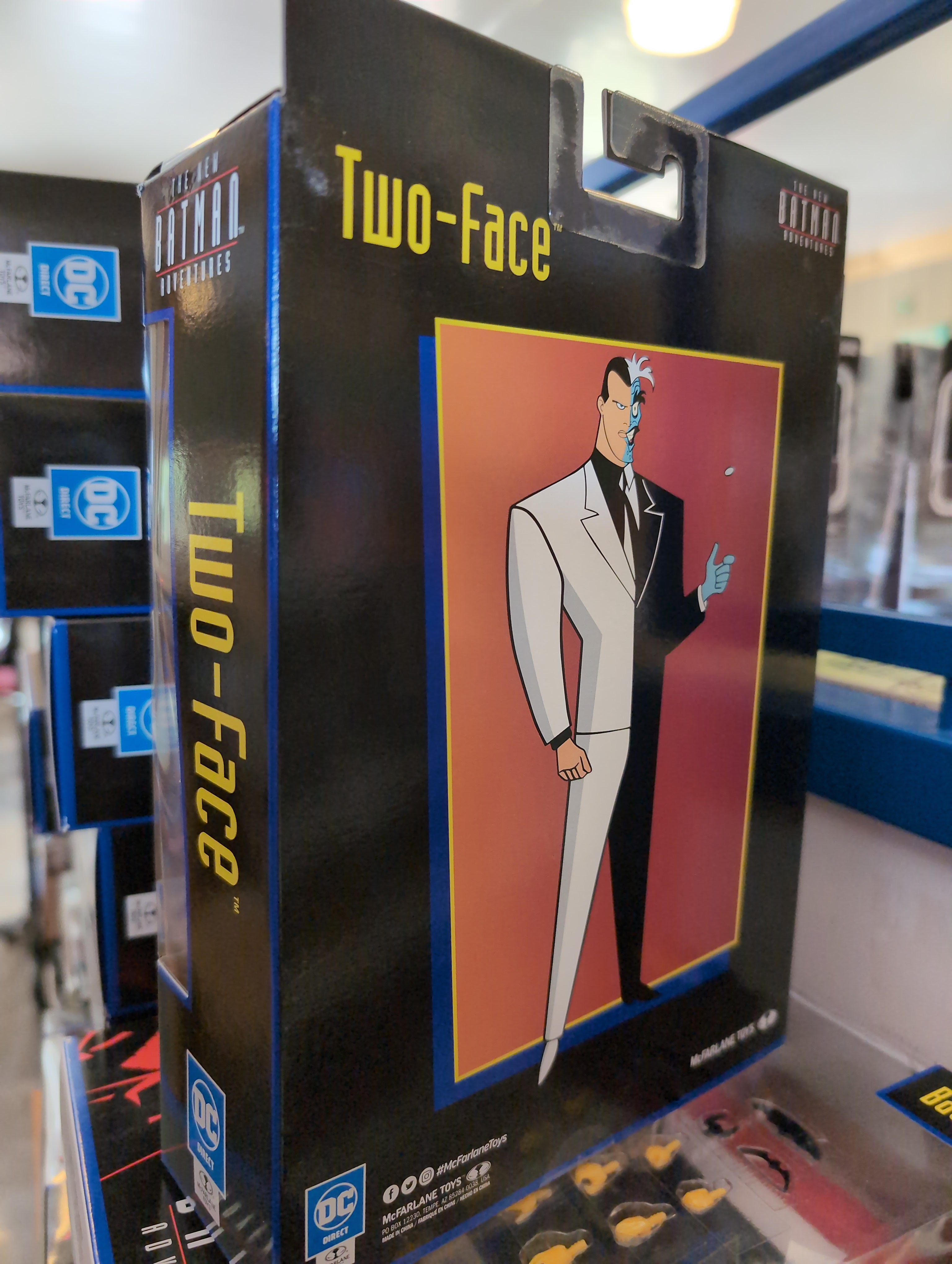 McFarlane Two-Face action figure packaging featuring stylized animated character from The New Batman Adventures series.